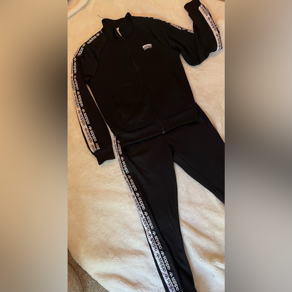 Adidas track suit (size small)